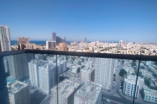 Charming 2-bedroom apartment with WiFi, AC in serene Ajman