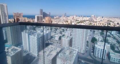 Charming 2-bedroom apartment with WiFi, AC in serene Ajman