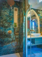 Shower, free toiletries, hair dryer, slippers