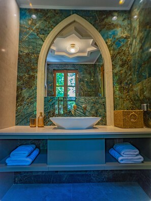 Shower, free toiletries, hair dryer, slippers