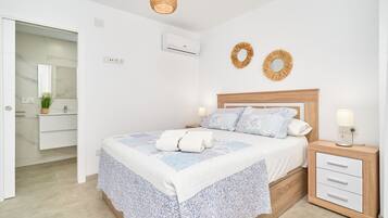 1 slaapkamer, een strijkplank/strijkijzer, wifi, beddengoed