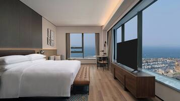 Elite Suite, 1 Bedroom, Sea View | Down duvets, free minibar, in-room safe, blackout curtains