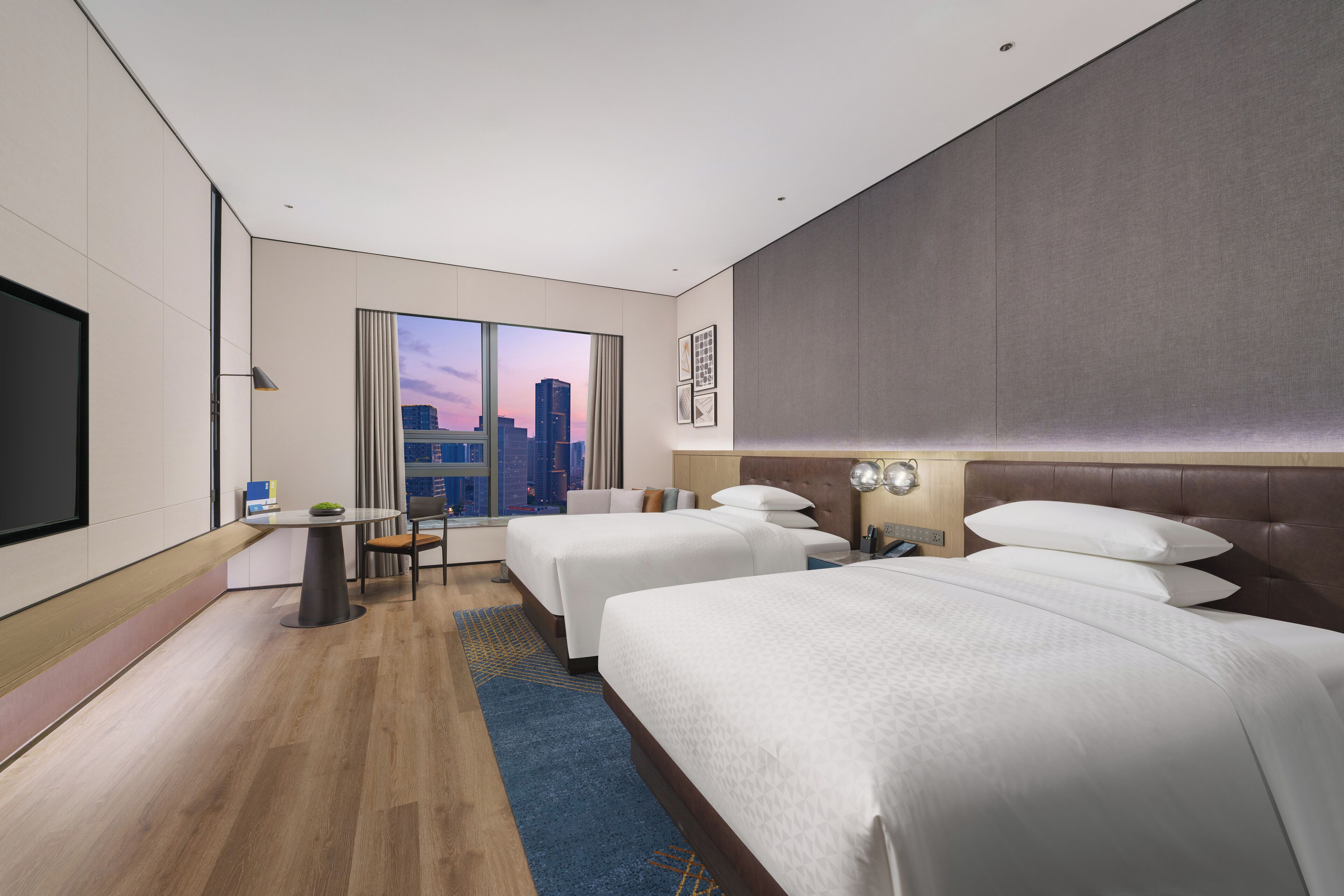 City Room, 2 Double Beds, City View | Down duvets, free minibar, in-room safe, blackout curtains