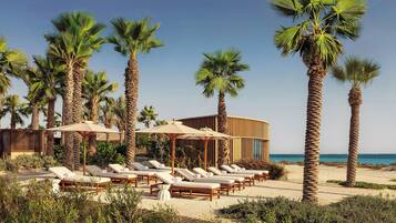 Private beach, white sand, beach cabanas, sun loungers