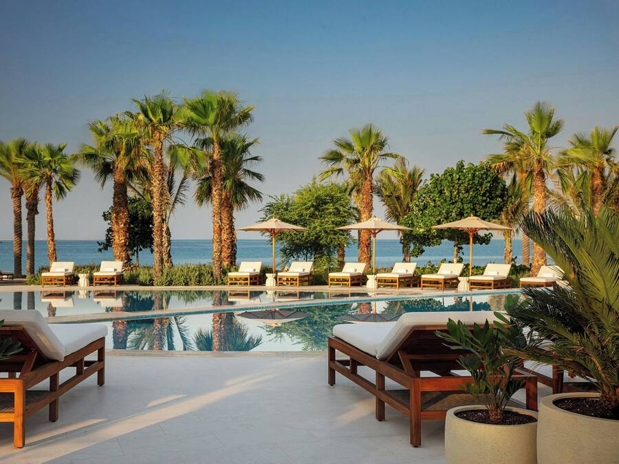 Outdoor pool, free pool cabanas, pool umbrellas