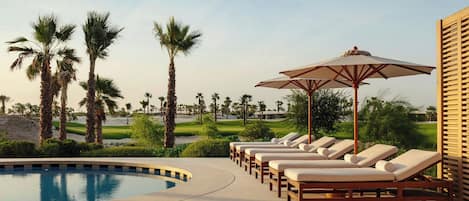 Outdoor pool, free pool cabanas, pool umbrellas