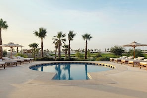 Outdoor pool, free pool cabanas, pool umbrellas