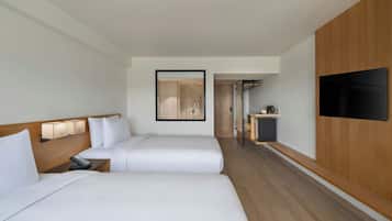 Hypo-allergenic bedding, in-room safe, laptop workspace