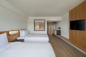 Hypo-allergenic bedding, in-room safe, laptop workspace