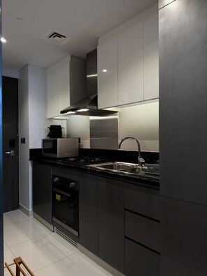 Microondas, horno y parrilla de estufa