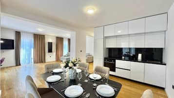 Executive Apartment | Living area | LED TV