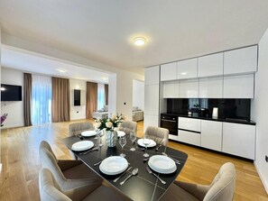 Lägenhet Executive | Vardagsrum | LED-tv