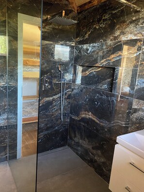 Shower, hair dryer, towels, soap
