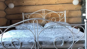 Tabla de planchar con plancha, wifi y ropa de cama