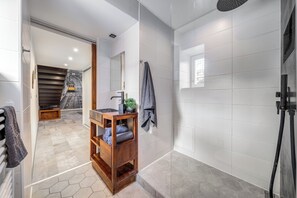 Shower, hair dryer, towels, soap