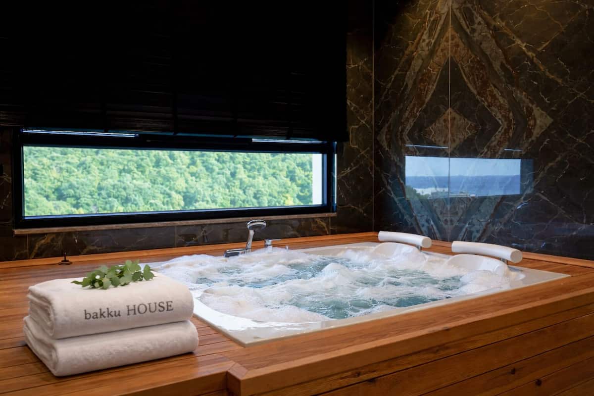 Svit Superior - havsutsikt | Minibar, värdeförvaringsskåp på rummet och mörkläggningsgardiner