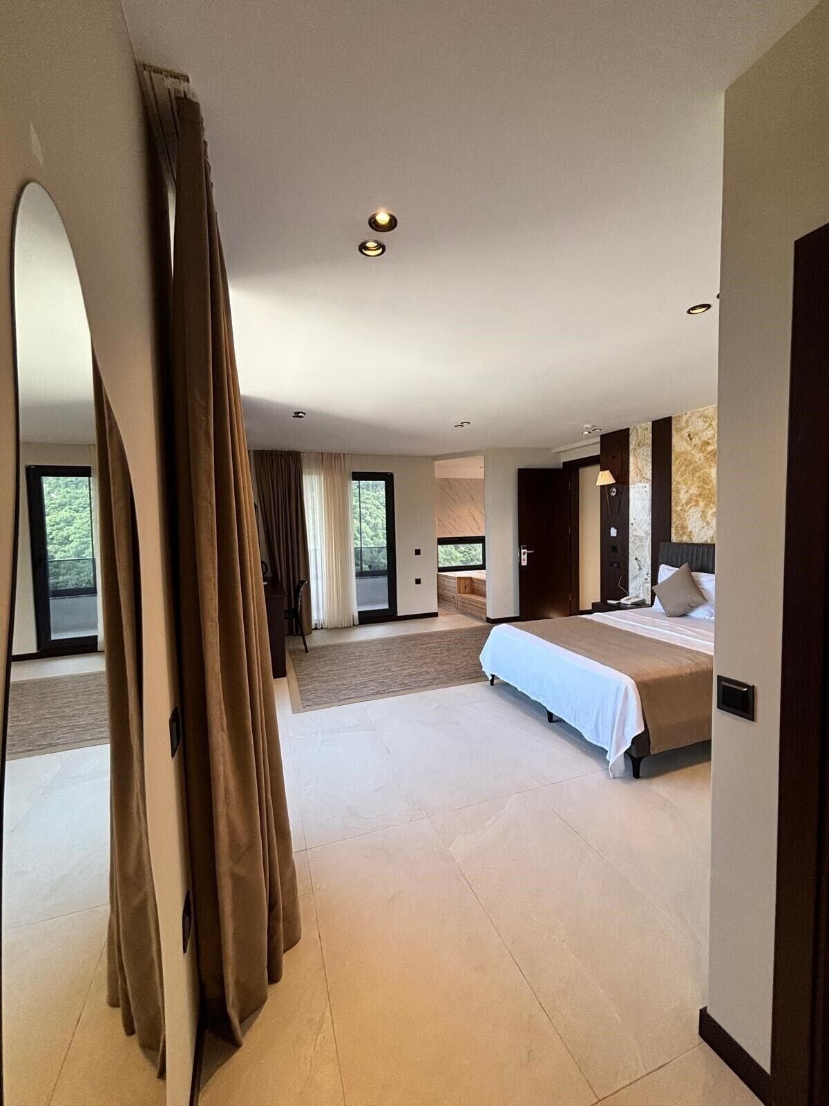 高级套房, 海景 | 迷你吧、客房内保险箱、遮光窗帘、隔音