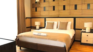 Triple Room, Garden View | Minibar, in-room safe, blackout drapes, soundproofing