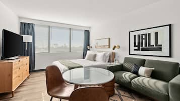 Suite estudio Prestigio, 1 cama Queen size, cocineta | Escritorio, espacio para trabajar con laptop y cortinas blackout