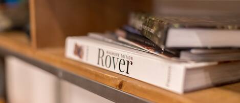 A bookshelf with a book titled 'WAGMORE EDITION Rover'.