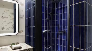 Suite, 1 King Bed with Sofa bed | Bathroom | Shower, free toiletries, hair dryer, slippers