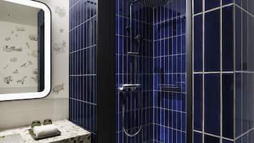 Suite, 1 King Bed with Sofa bed | Bathroom | Shower, free toiletries, hair dryer, slippers