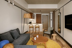 Suite, 1 King Bed with Sofa bed | In-room safe, blackout drapes, iron/ironing board, free WiFi