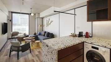 Suite, 1 King Bed with Sofa bed | In-room safe, blackout drapes, iron/ironing board, free WiFi