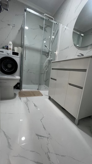 Shower, bidet, towels, soap