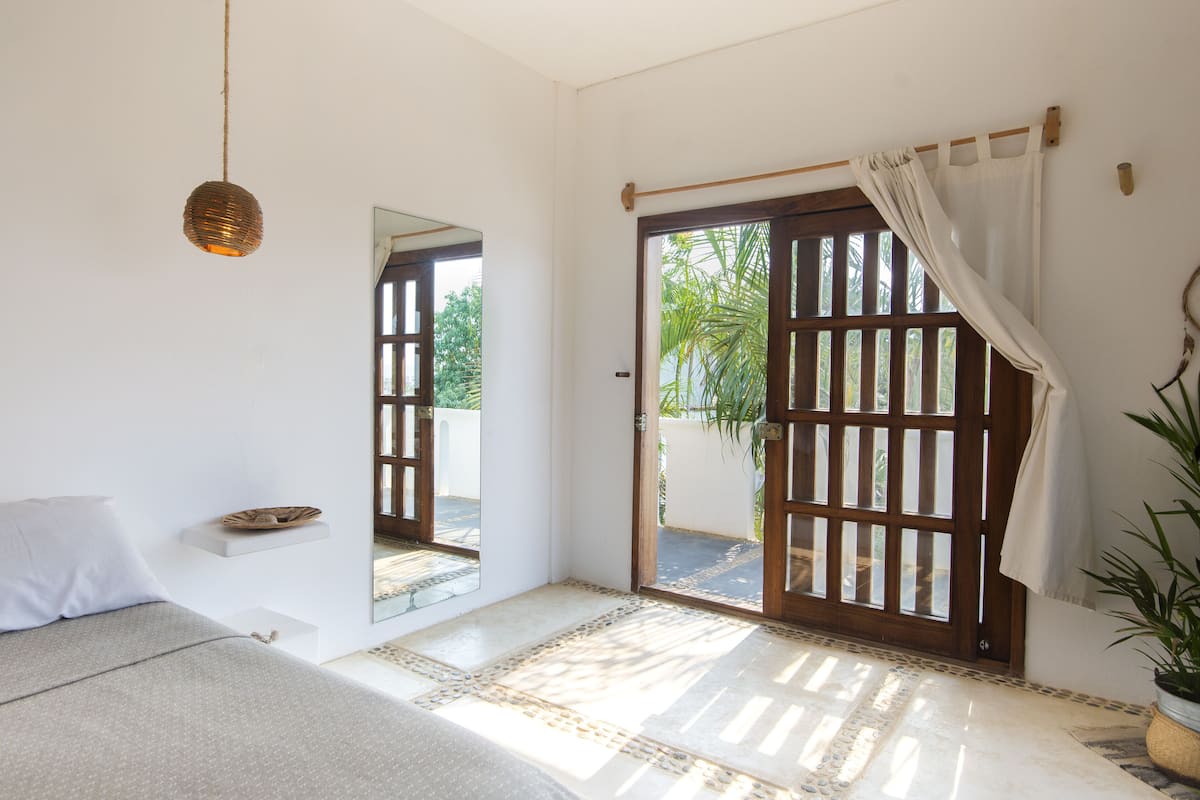 Comfort Double Room, Partial Ocean View | Blackout drapes, iron/ironing board, free WiFi