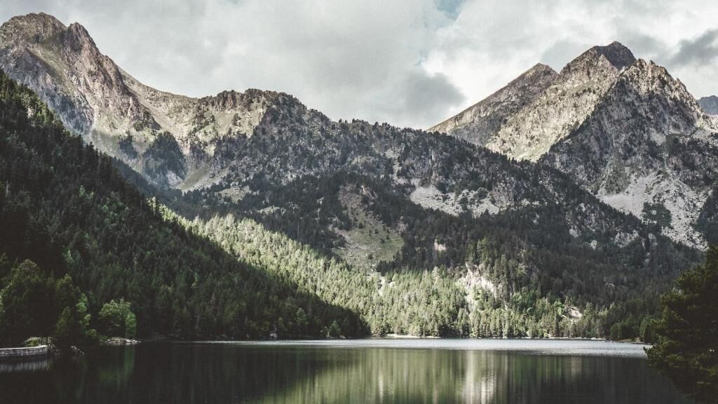 A mountain landscape with a lake.