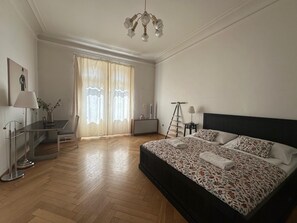 1 bedroom, desk, iron/ironing board, travel crib