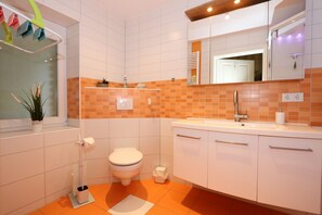 Hair dryer, towels, soap, toilet paper