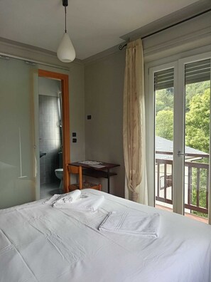 Quarto básico, vista para a cidade | Wi-Fi de cortesia