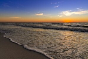 On the beach, sun loungers, beach towels
