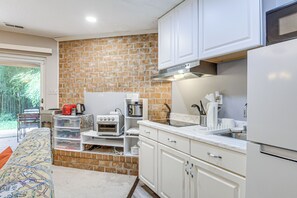 Fridge, microwave, coffee/tea maker, toaster