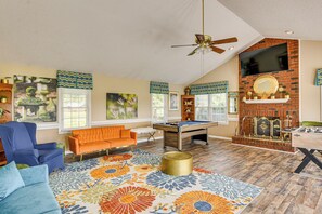 TV, fireplace, table football - 78-Acre Retreat Near Campbell U: Fish, Play, Relax (Coats)