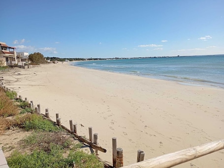 On the beach, white sand