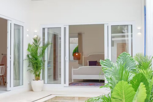 Boho Chic 2BR Villa w/ Pool & Rooftop Near Beach