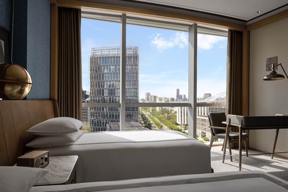 Premium bedding, free minibar items, in-room safe, desk