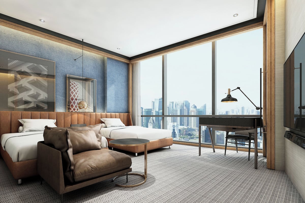 Premium bedding, free minibar items, in-room safe, desk