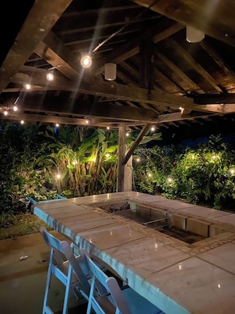 Terrace/patio. Dog-friendly tropical villa - private space with barbecue and starry sky (3-minute walk to the beach)