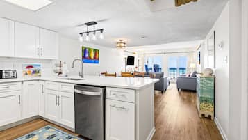Condo, Multiple Beds, Balcony, Ocean View (Pinnacle Port B2306) | Private kitchen | Fridge, microwave, oven, stovetop