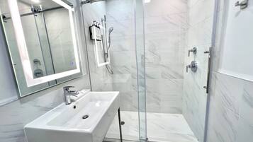 Hair dryer, towels, soap, shampoo