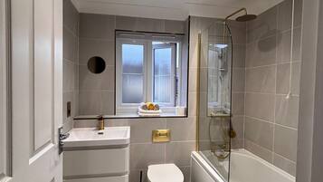 Hair dryer, towels, soap, toilet paper