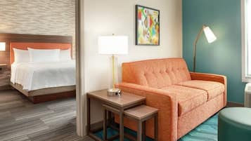 Desk, laptop workspace, blackout drapes, iron/ironing board