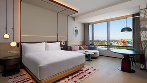 Minibar, desk, blackout curtains, iron/ironing board