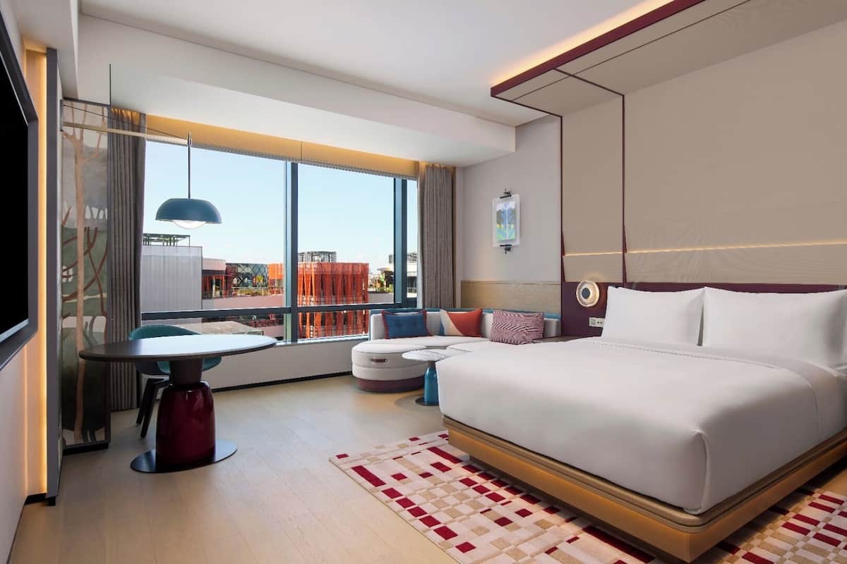 Minibar, desk, blackout curtains, iron/ironing board