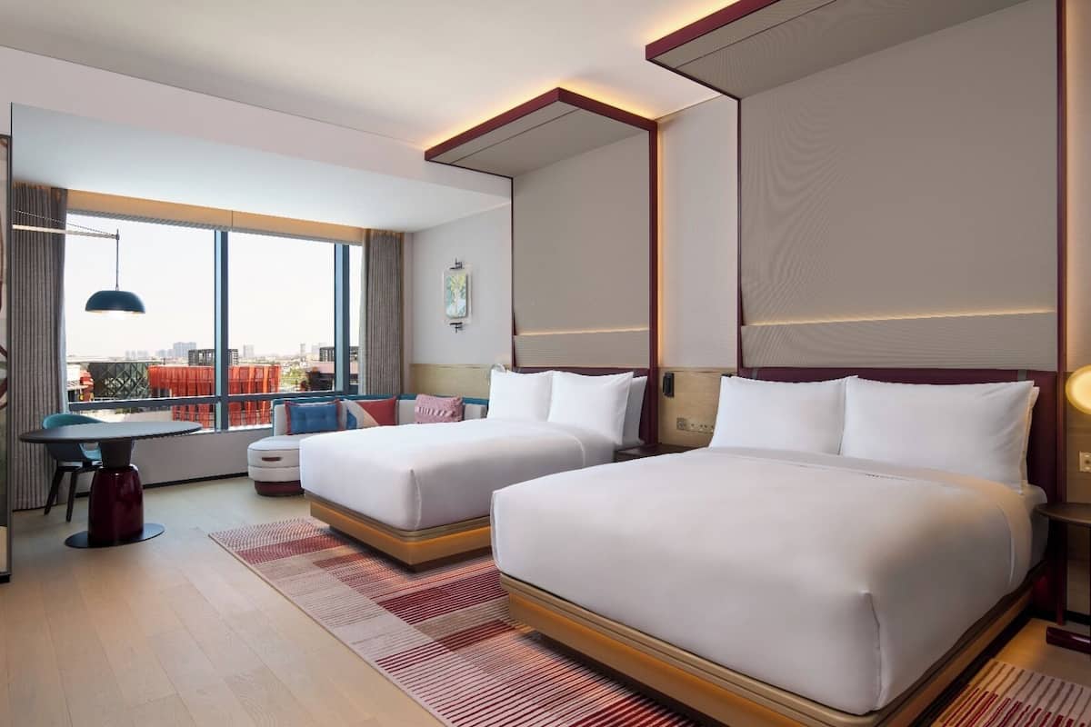 Minibar, desk, blackout curtains, iron/ironing board