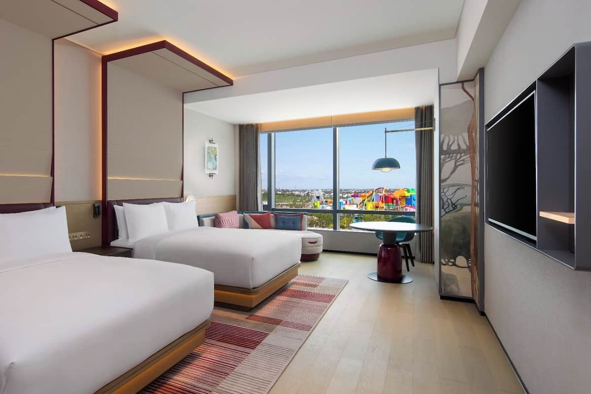 Minibar, desk, blackout curtains, iron/ironing board